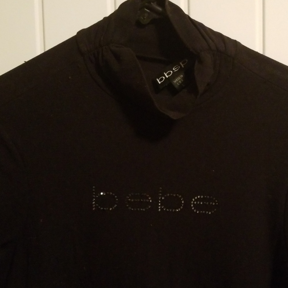 BEBE black Rhinestone sheer blouse no damages